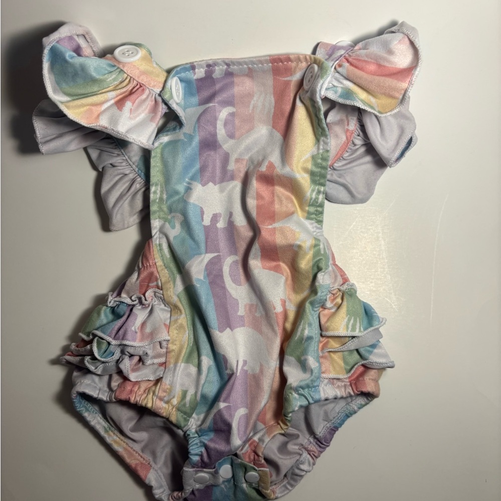 Pastel Rainbow Ruffle One-Piece Bodysuit with White Dino Print
